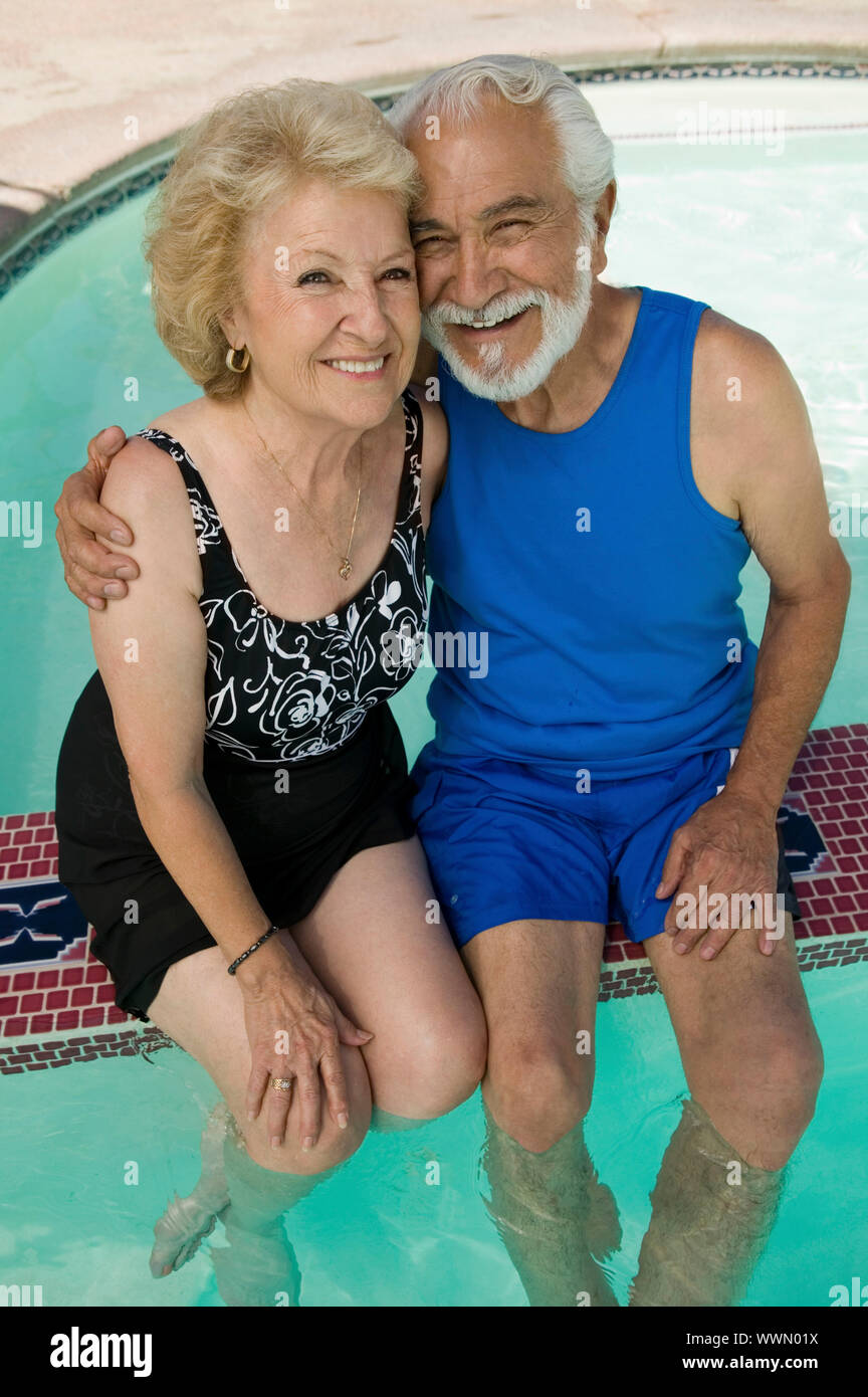 Senior Couple in Swimming Pool Stock Photo - Alamy