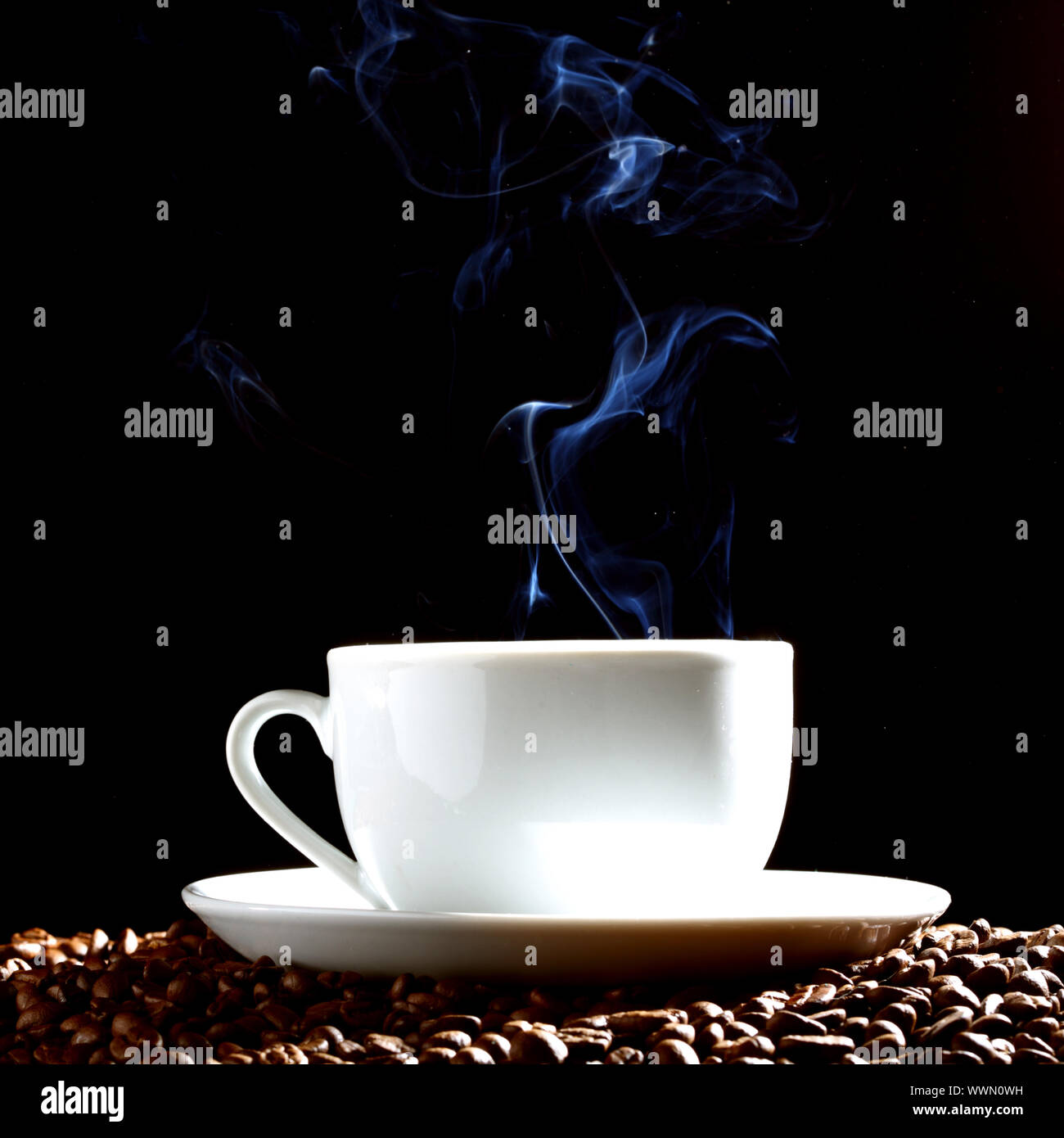 coffee background aroma and beans on black Stock Photo - Alamy