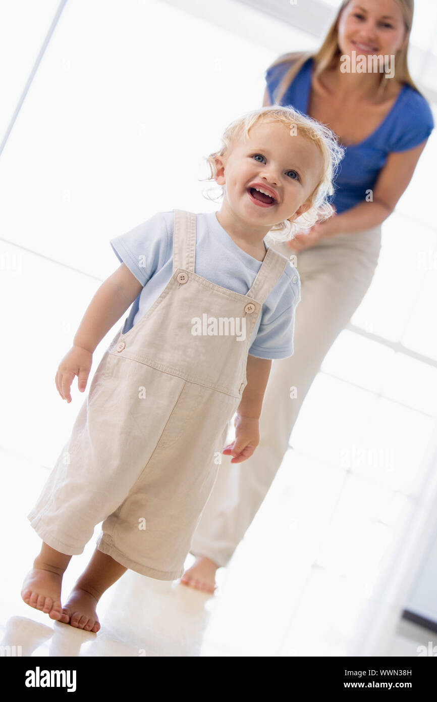 Mother and son indoors smiling Stock Photo