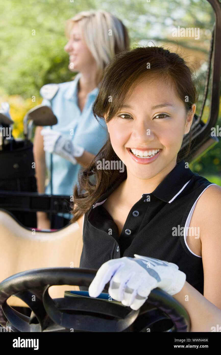 Golfer Sitting in Golf Cart Stock Photo Alamy
