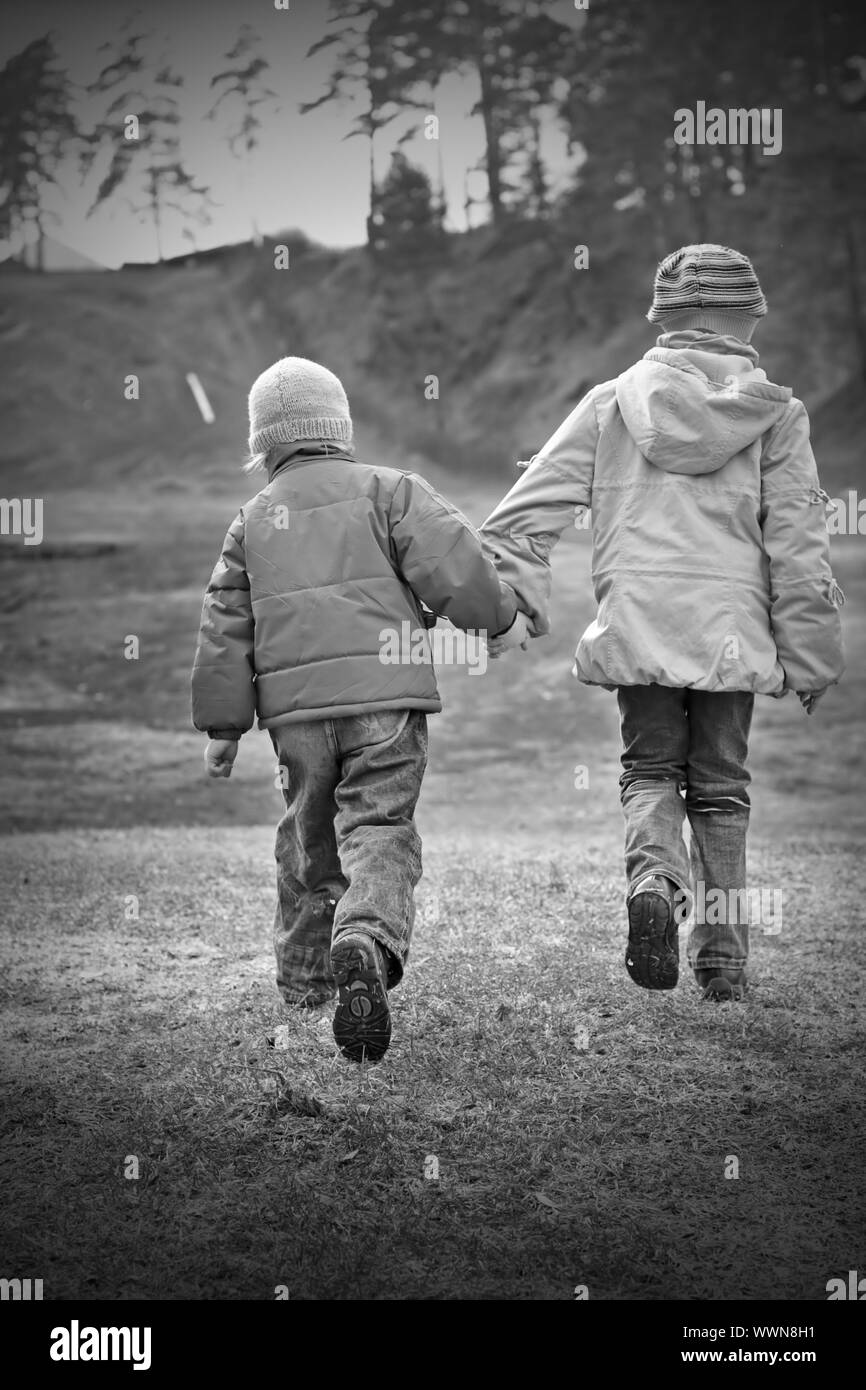 Two Girls Holding Hands Running Black And White Stock Photos Images Alamy Two Girls Holding Hands Running Black And White Stock Photos Images Alamy