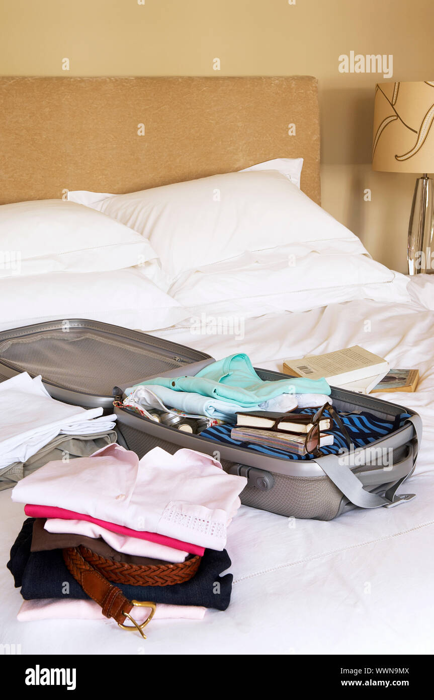Packed Suitcase on Bed Stock Photo Alamy