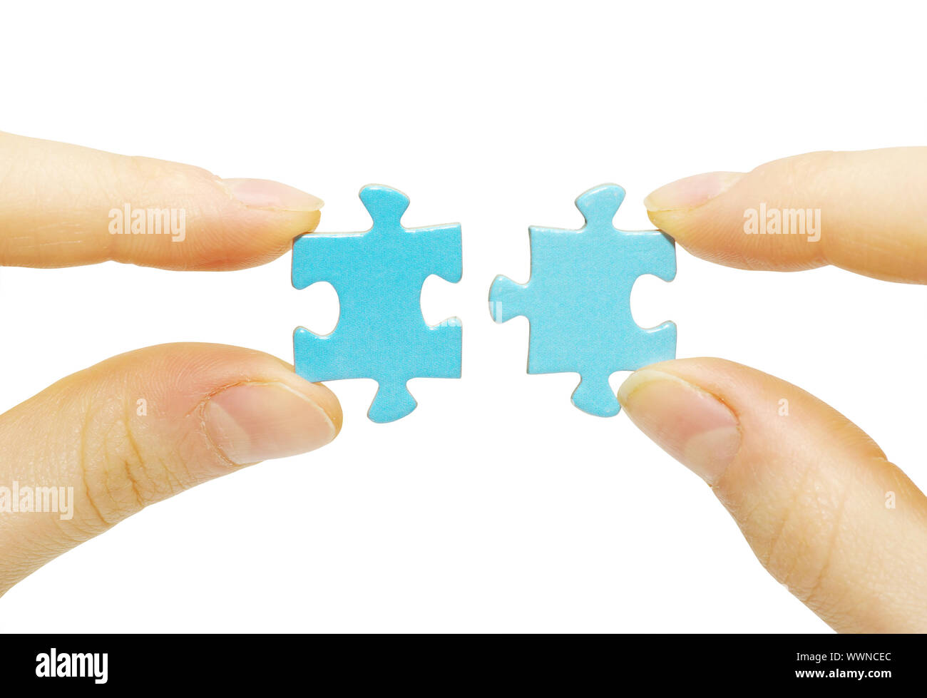 puzzle in hand isolated on white background Stock Photo - Alamy