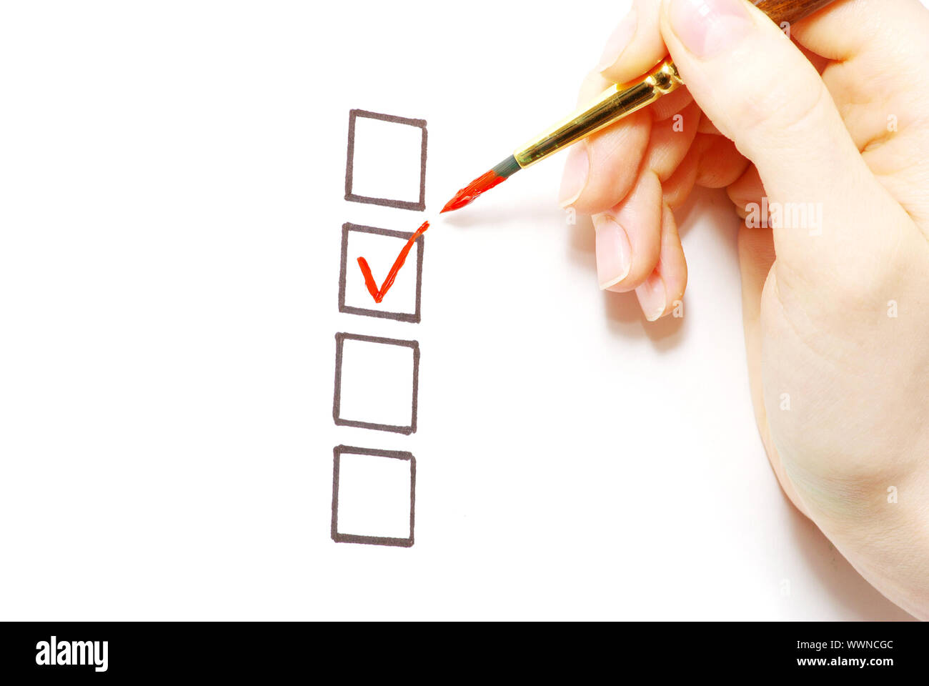Hand with brush and check boxes isolated on white Stock Photo - Alamy