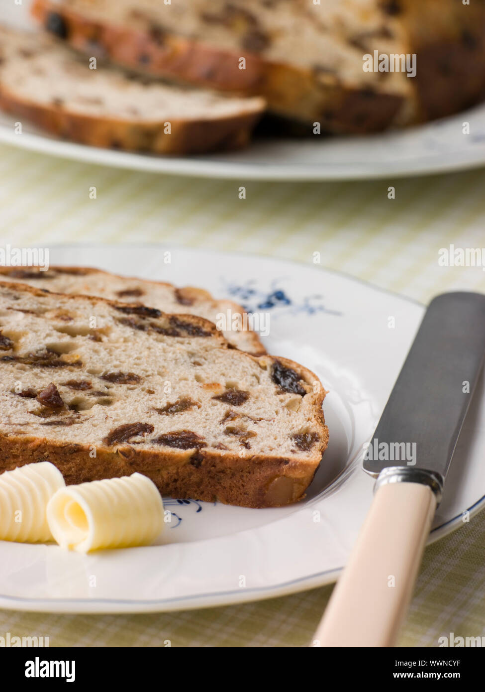 Slice of Barm Brack with Butter Stock Photo