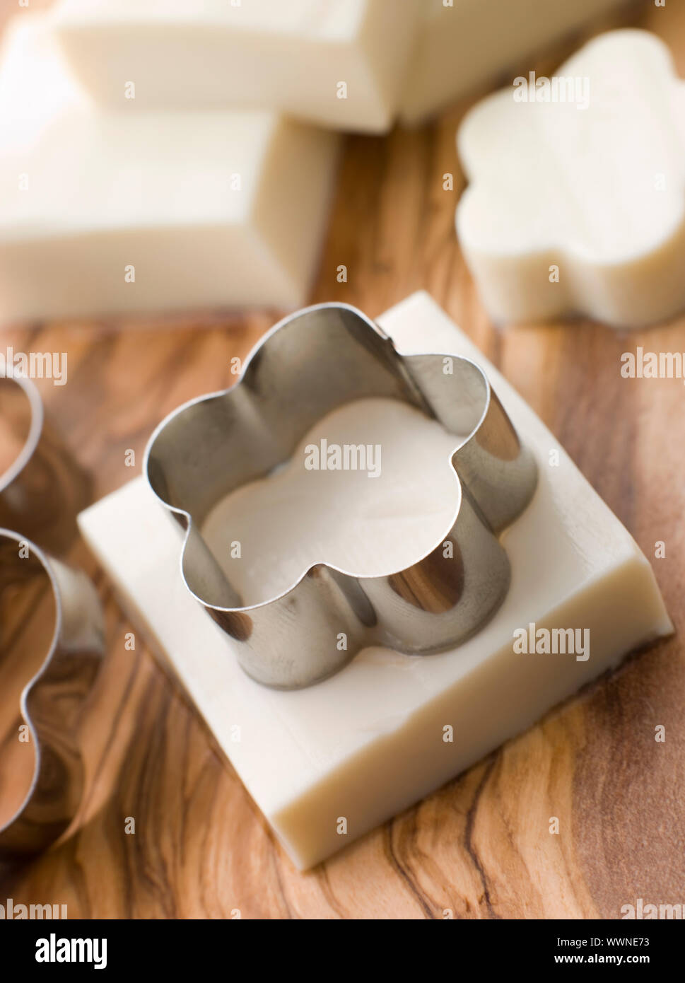 Firm Tofu on a Chopping Board with shape cutter Stock Photo - Alamy