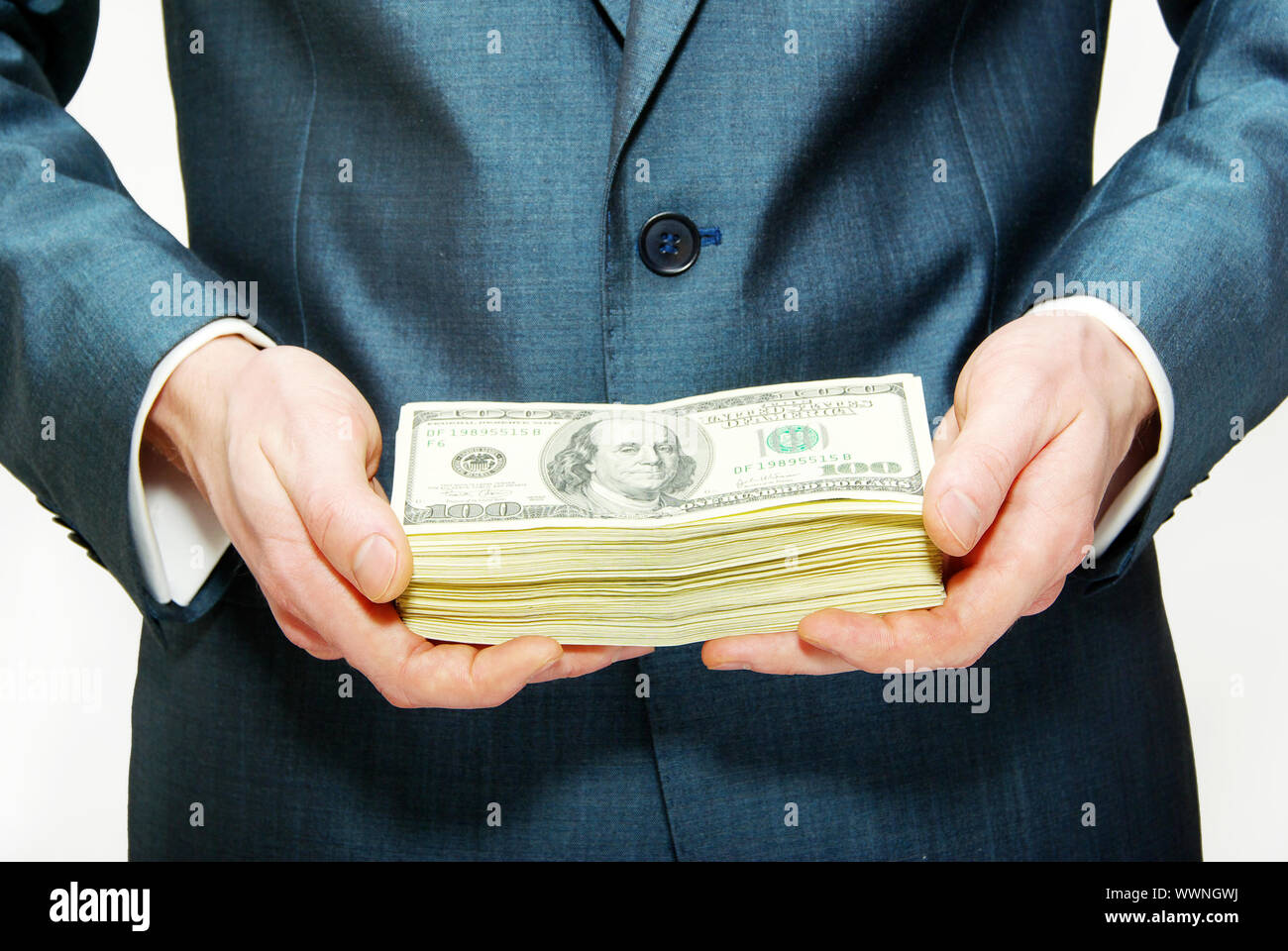 Hand with money isolated on white background Stock Photo - Alamy