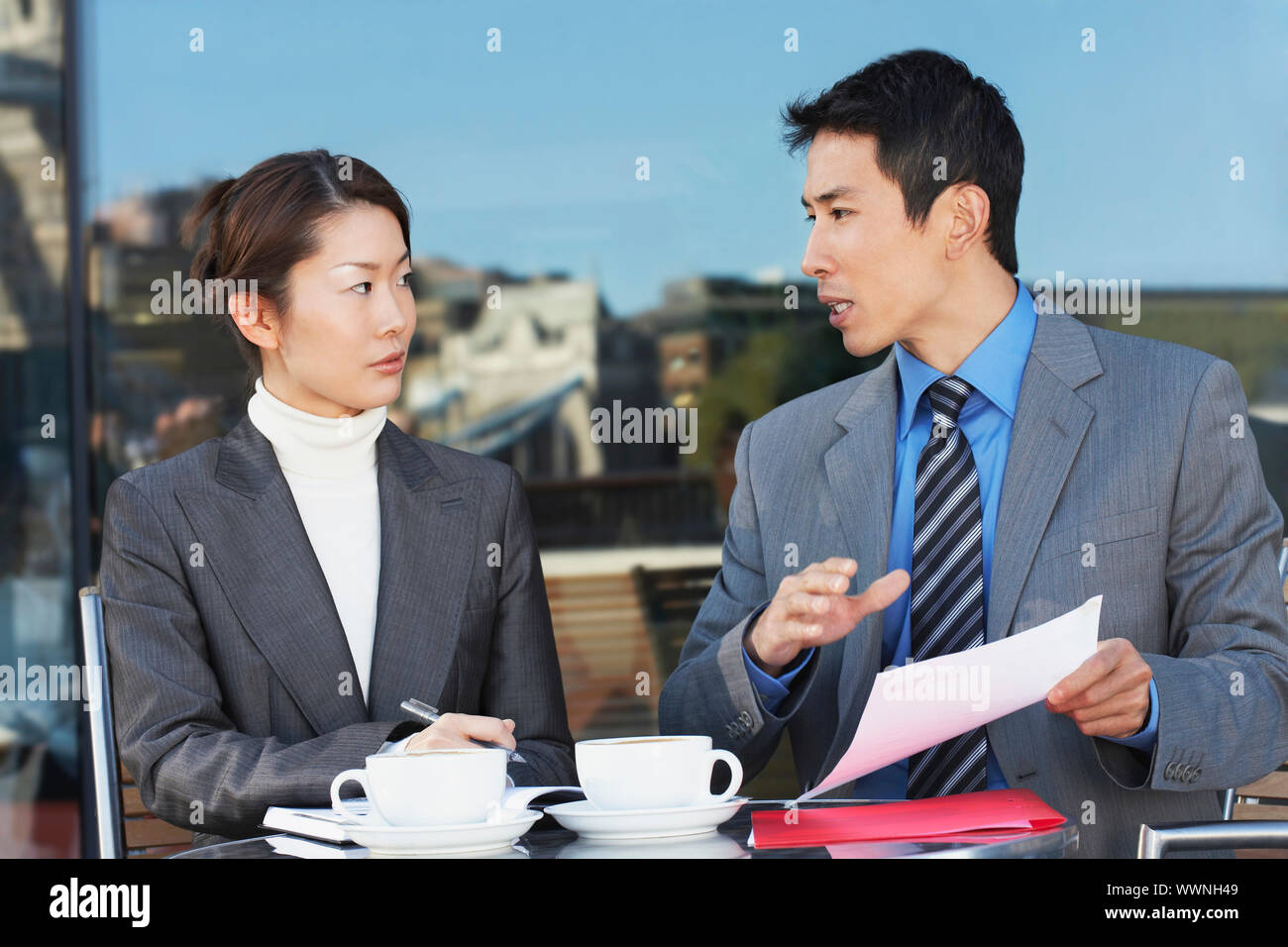 Businesspeople Meeting at Cafe Stock Photo