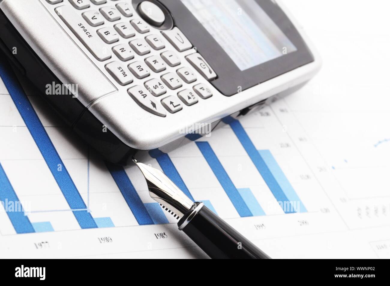 business or finance still life with pen and chart Stock Photo