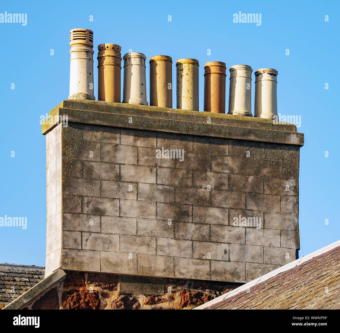 Multiple Chimney Pots on a roof Stock Photo