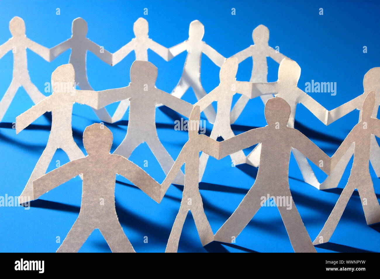 team of paper people having a party Stock Photo Alamy