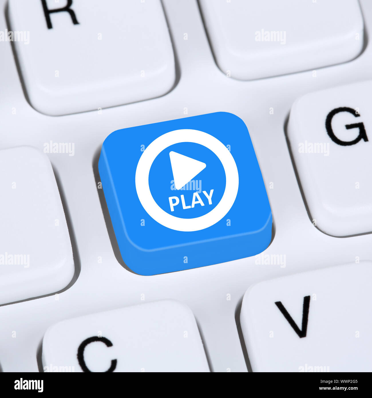 Computer Concept Play Button to listen to music or movies on the Internet Stock Photo