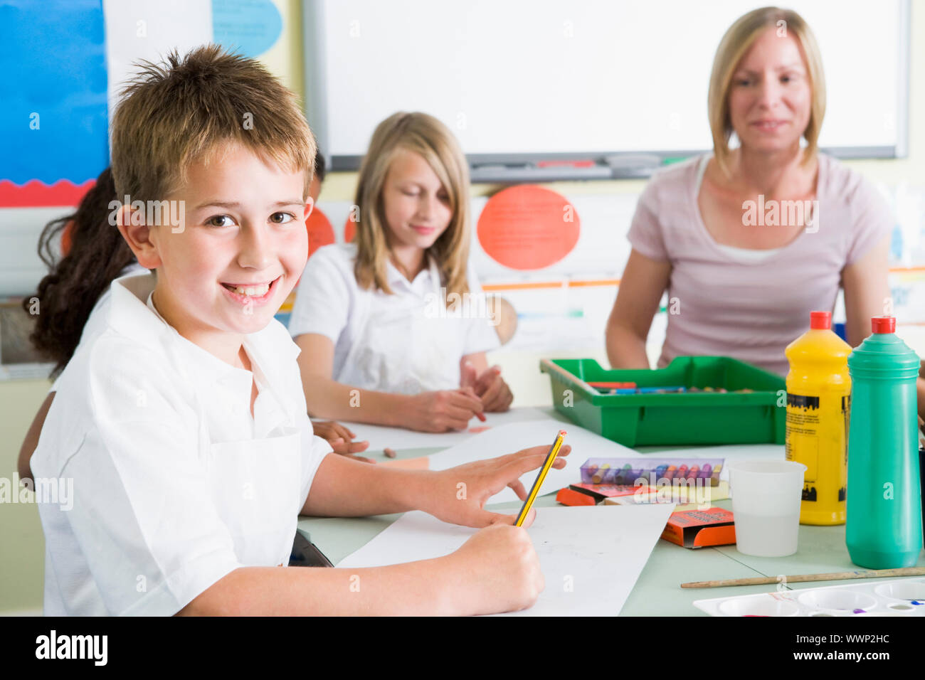 Students in art class with teacher Stock Photo - Alamy