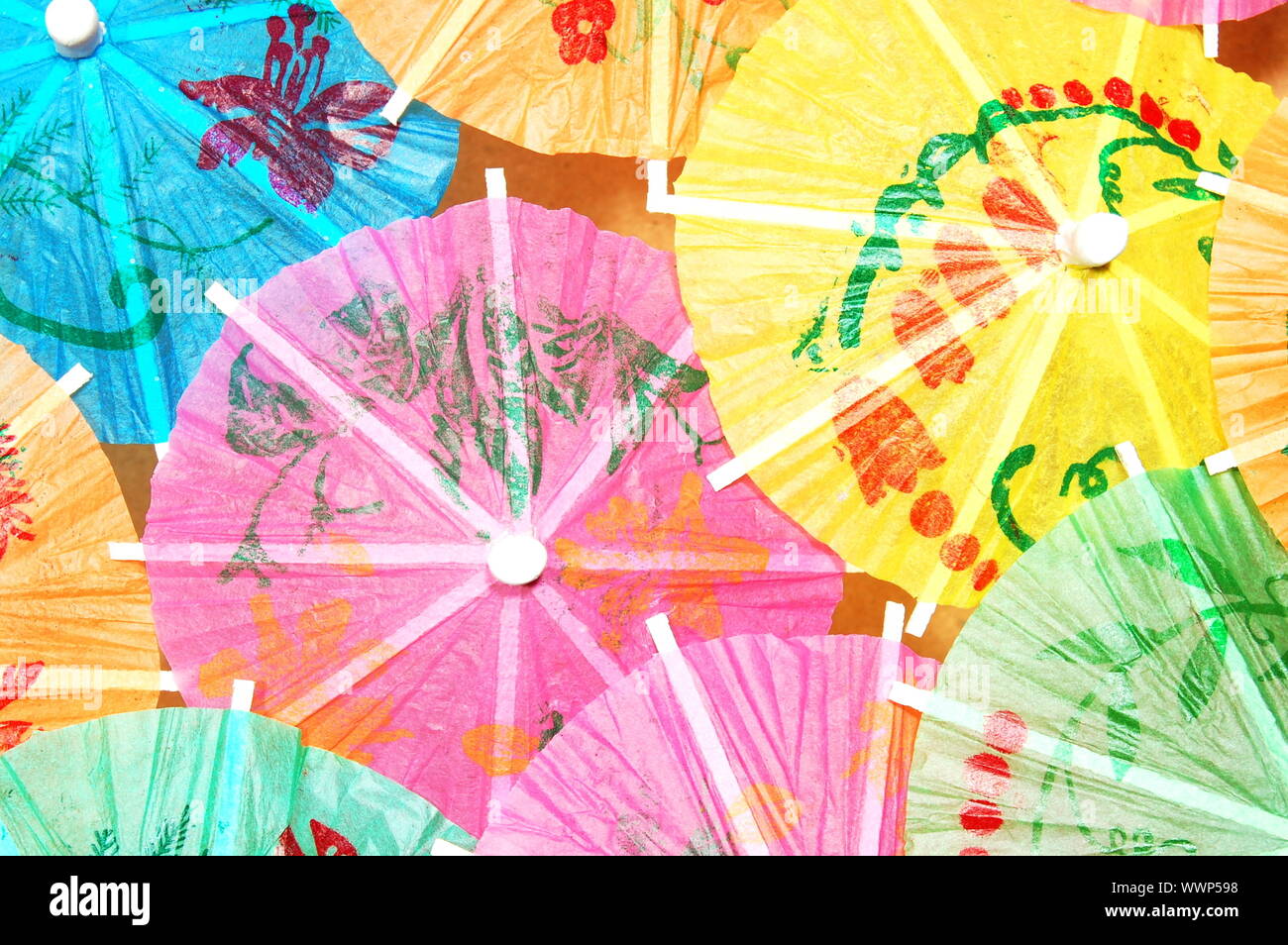 party background with cocktail umbrella and copyspace Stock Photo - Alamy