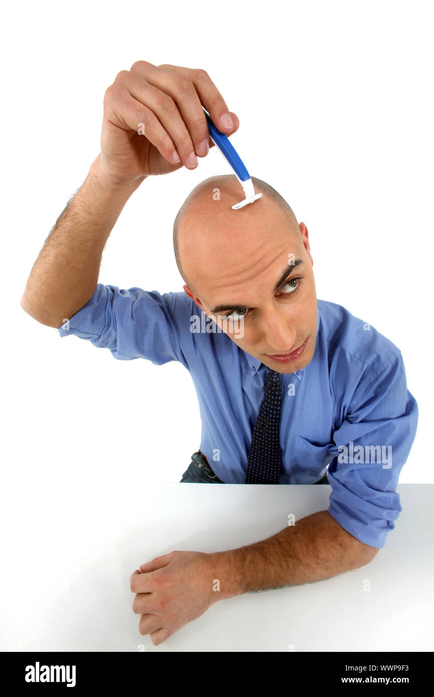 man shaving his head Stock Photo Alamy