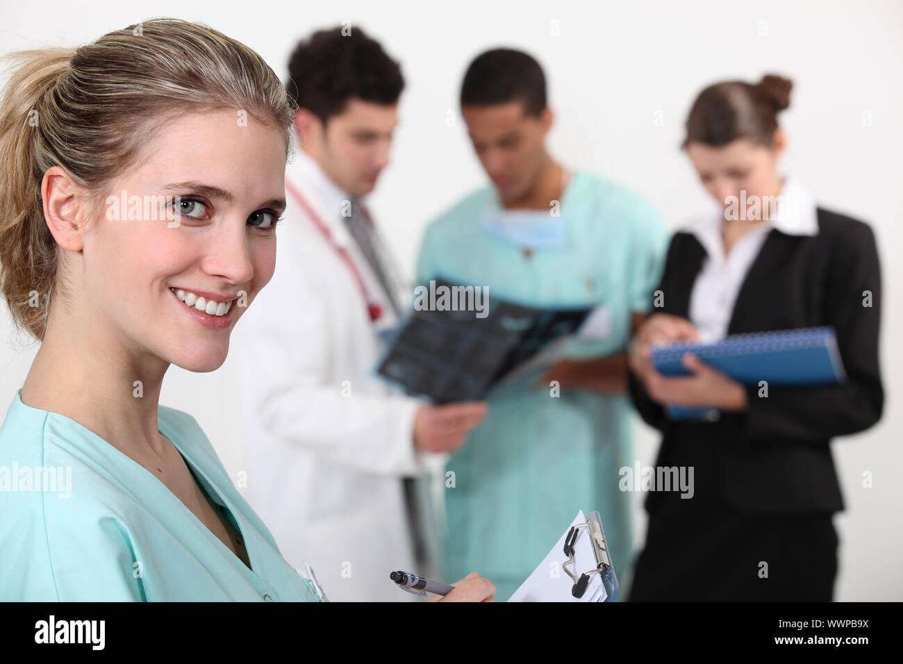 A team of doctors conferring Stock Photo