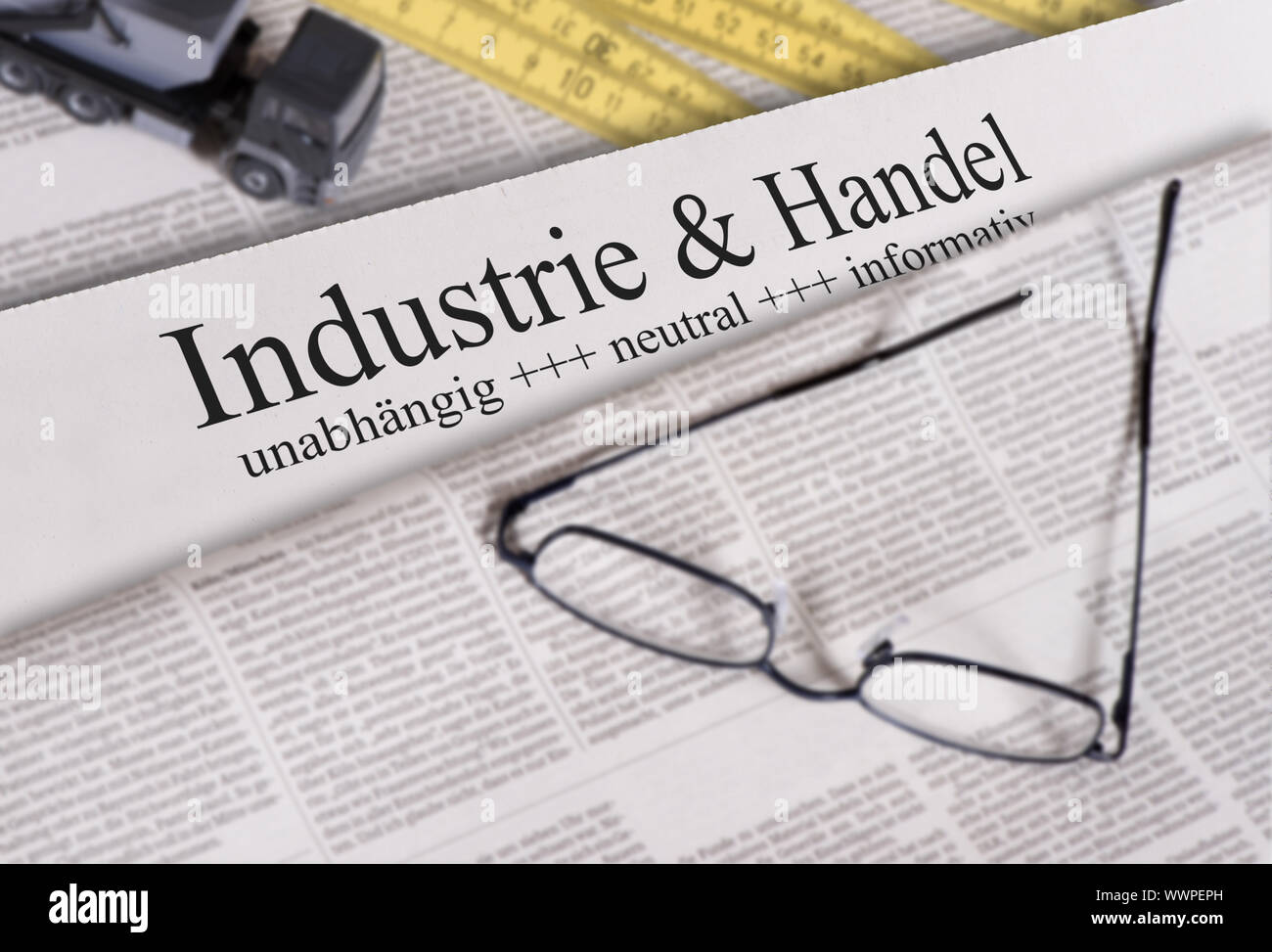 Newspaper with headline Industry and Trade Stock Photo