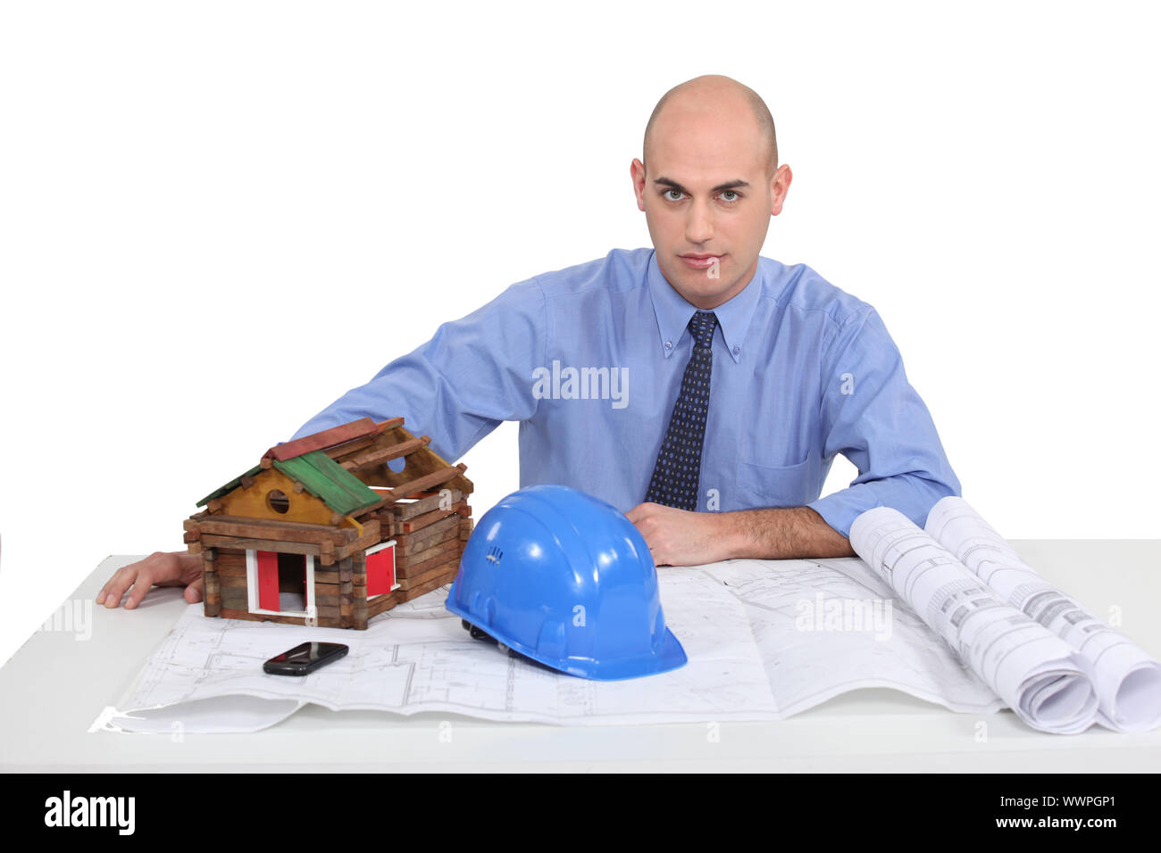 Architect sat at his desk Stock Photo