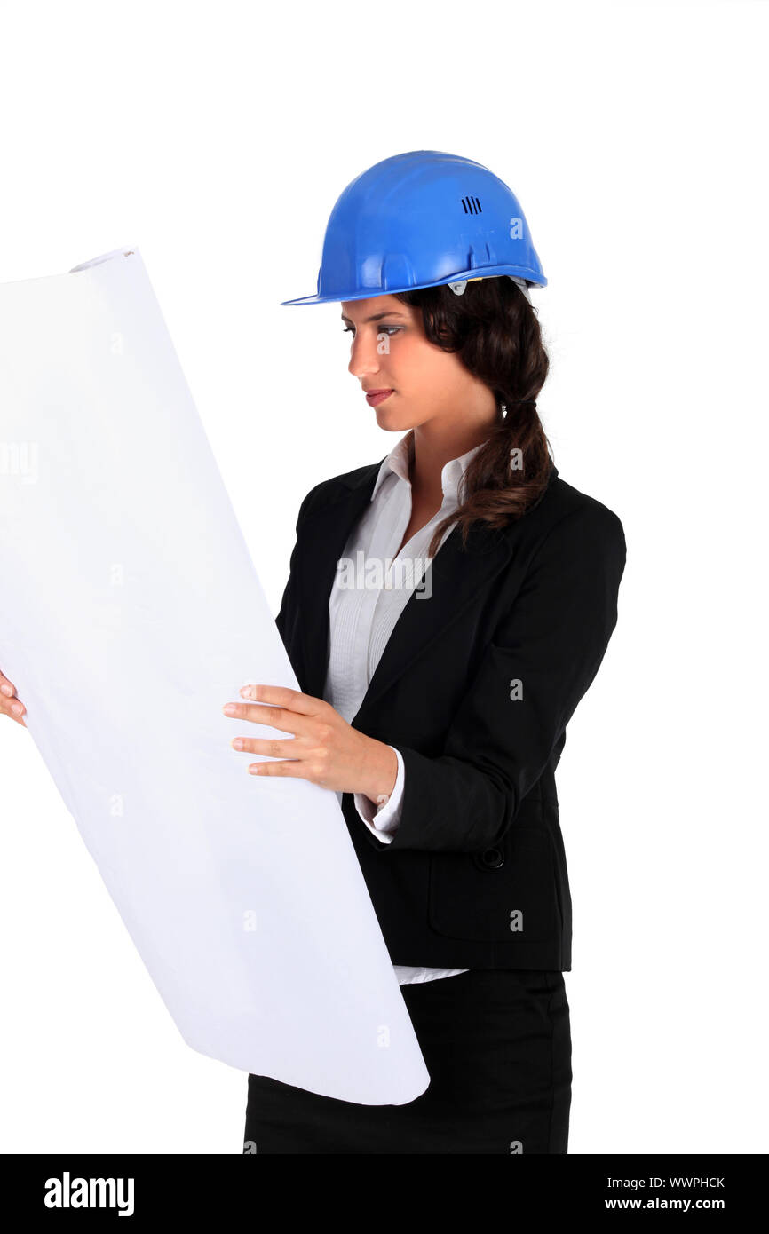 Business woman with a helmet Stock Photo - Alamy