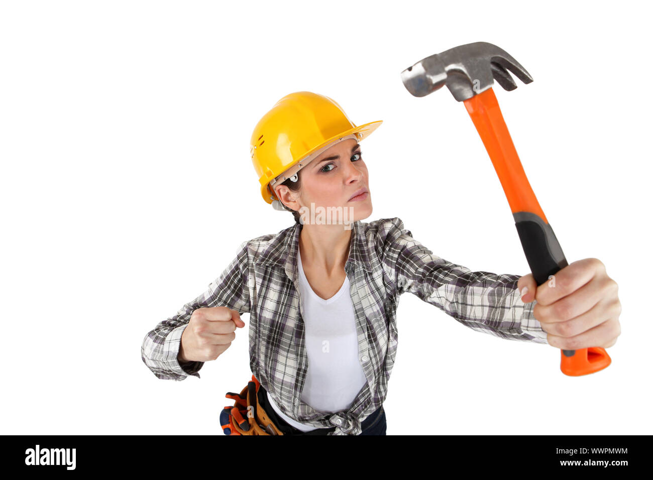 An angry female construction worker with a hammer Stock Photo - Alamy
