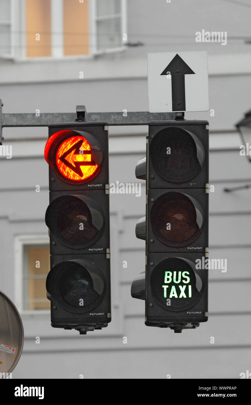 Traffic light with free travel for bus and taxi Stock Photo