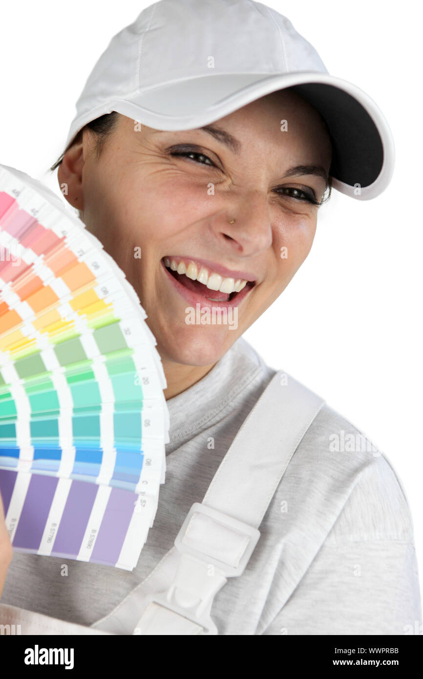 Decorator holding paint color charts Stock Photo Alamy