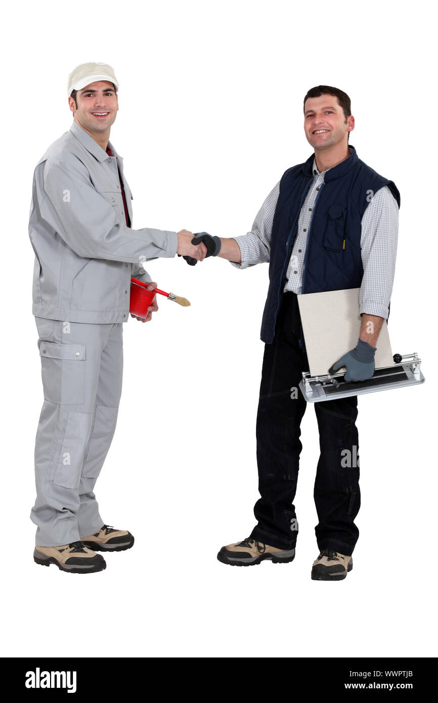 Artisans hand in hand Stock Photo - Alamy