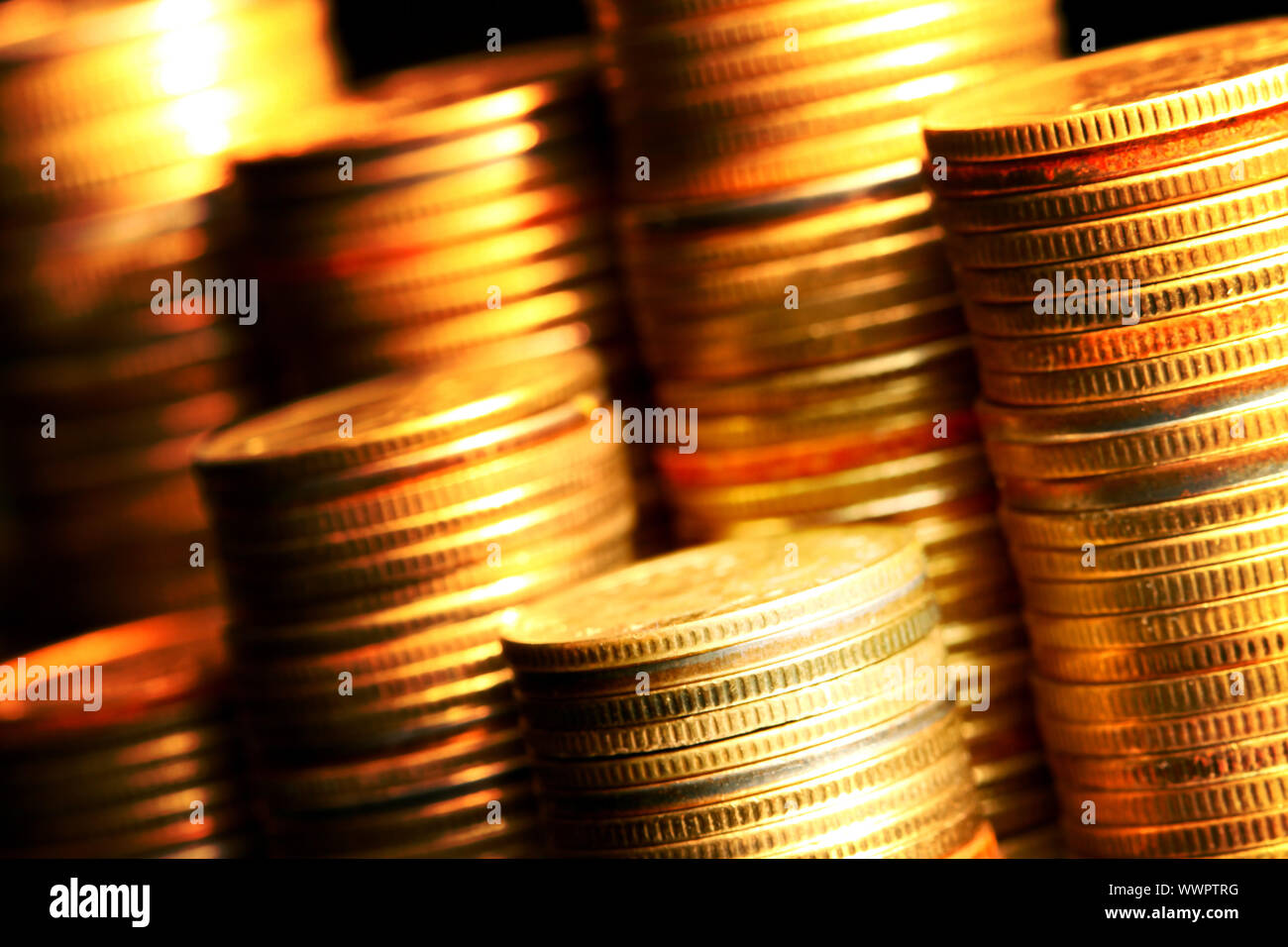 Golden coins macro close up Stock Photo - Alamy