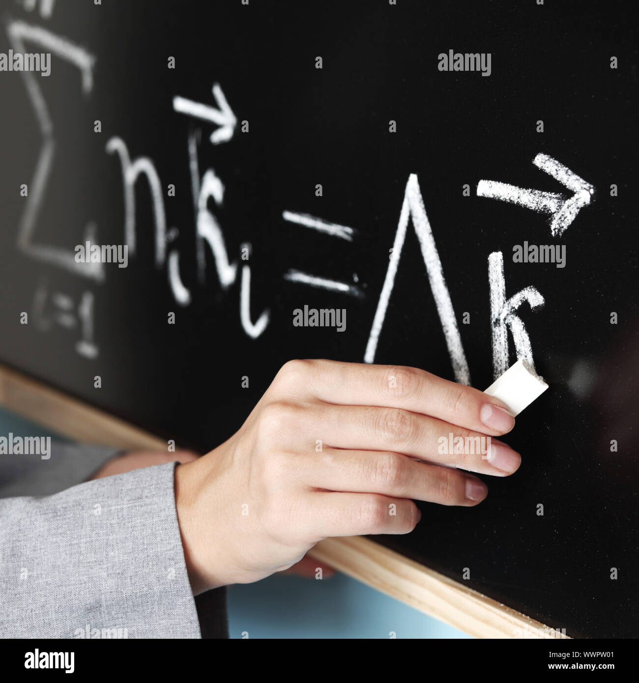 teacher draw condition of phase synchronism Stock Photo