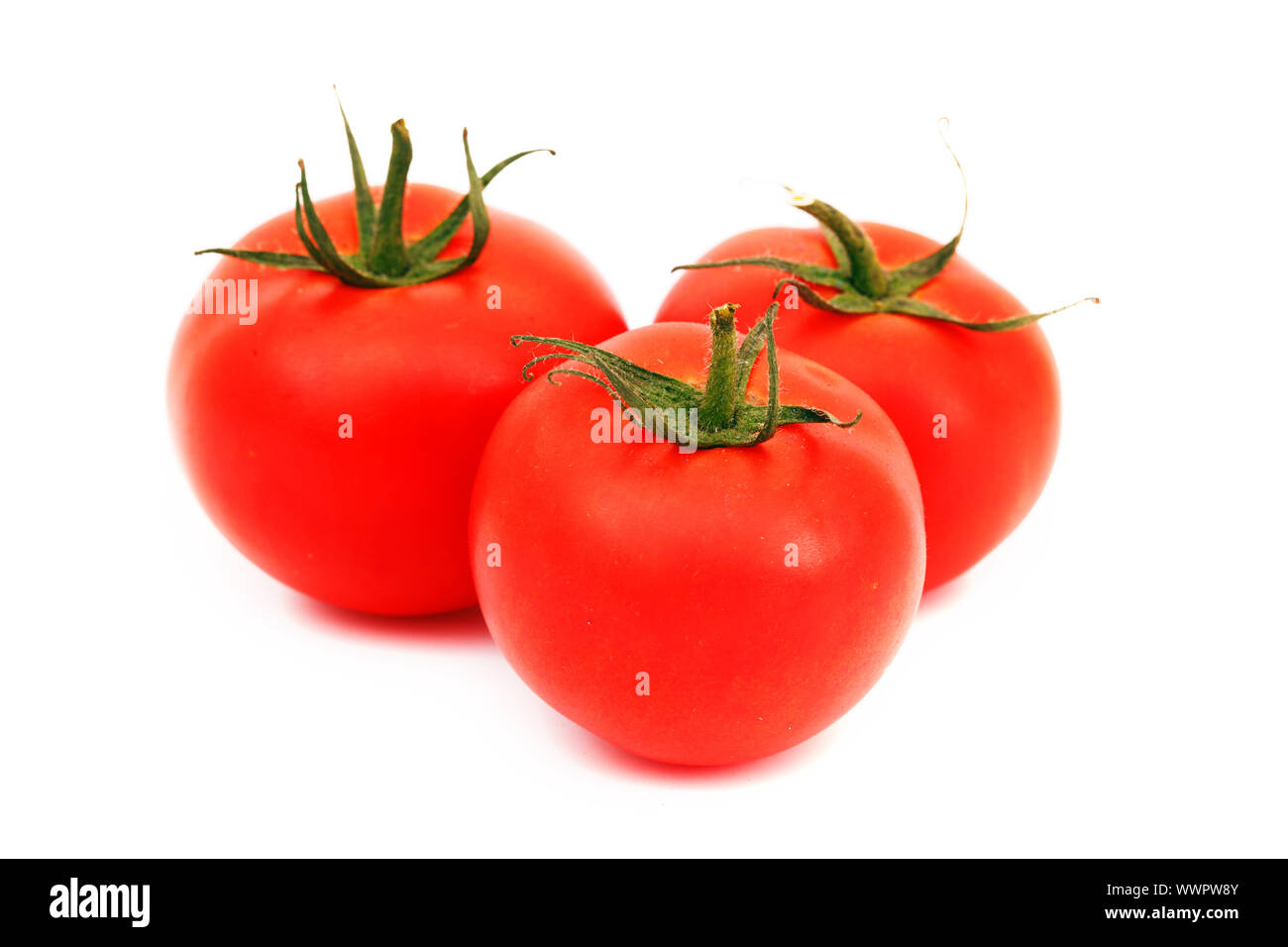 tomato pile isolated on white Stock Photo - Alamy