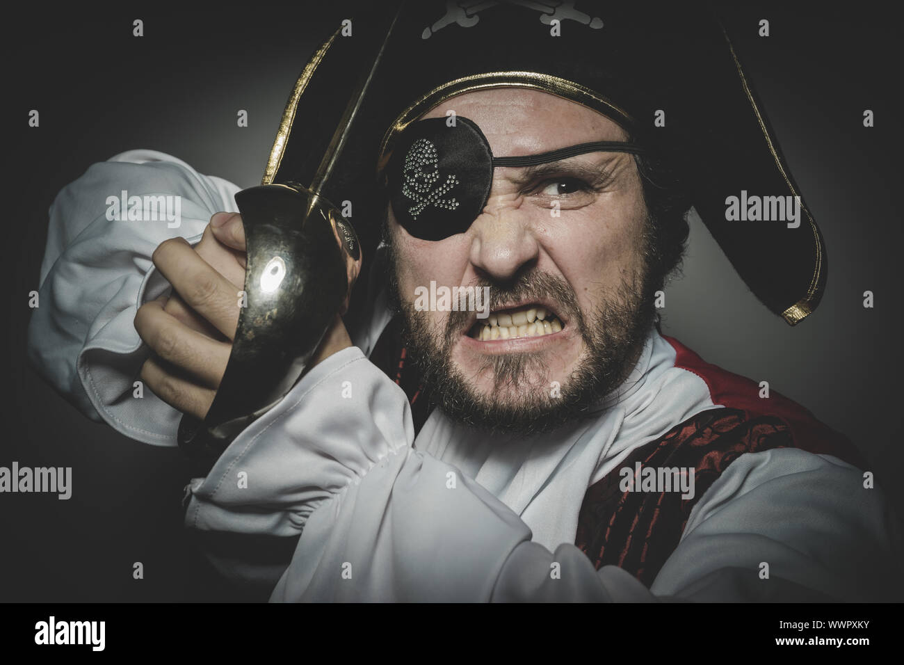 man pirate with eye patch and old hat with funny faces and expressive