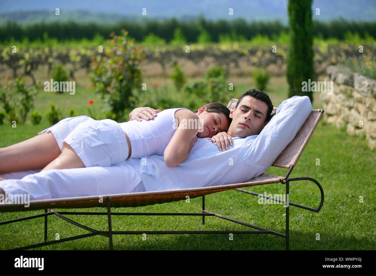 Young woman resting on sun lounger hi-res stock photography and images ...