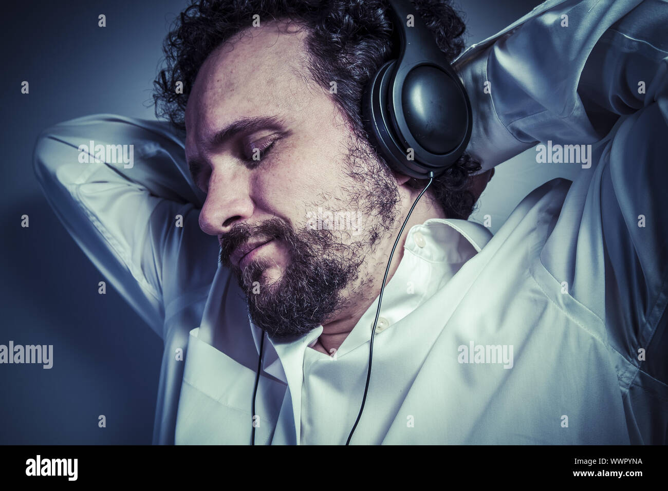 classical music, man with intense expression, white shirt Stock Photo