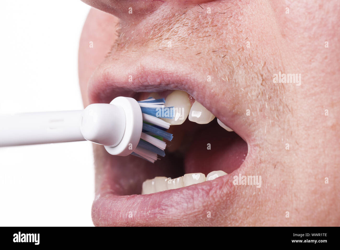 Close up of electric toothbrush and paste on white Stock Photo