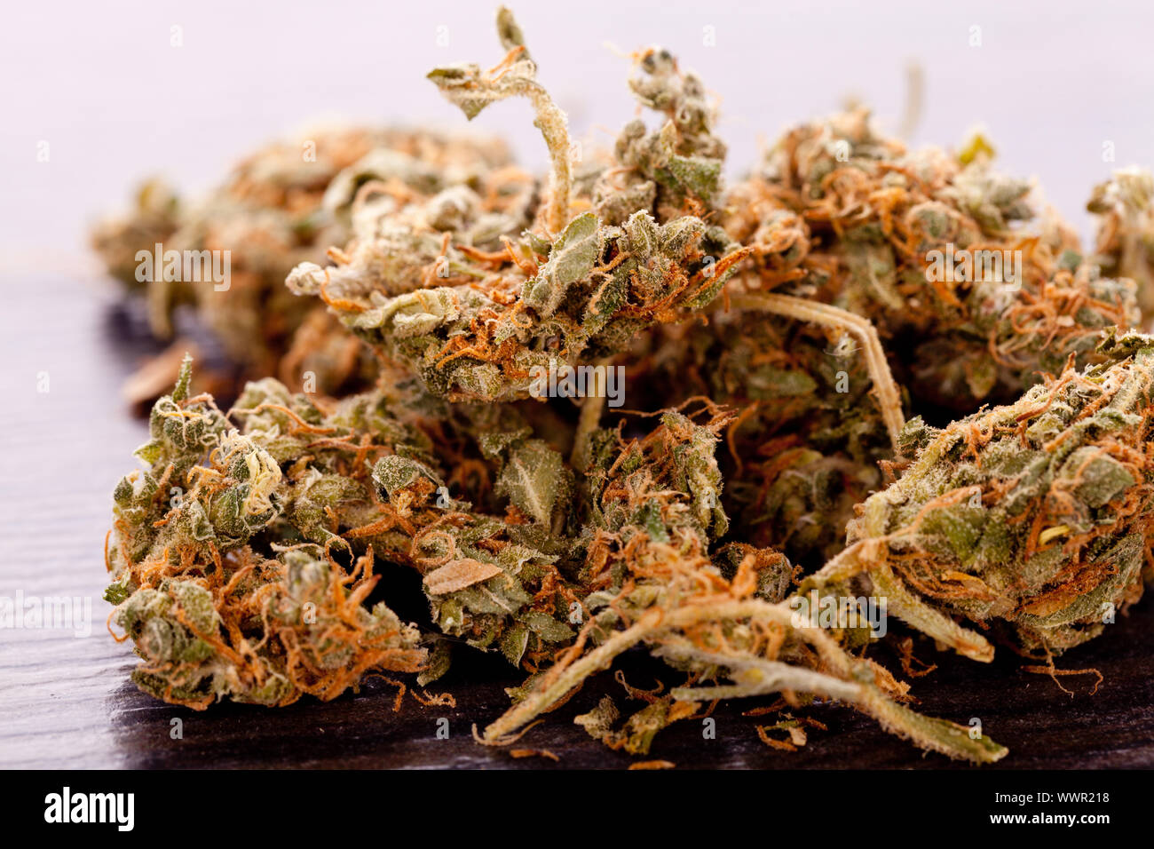 Close up Dried Marijuana Leaves on the Table Stock Photo