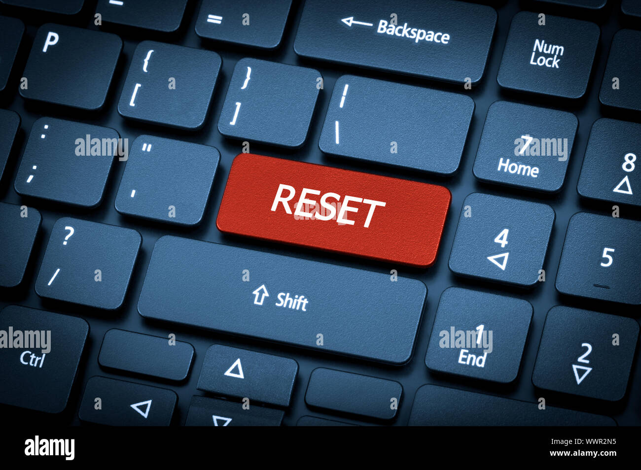 Laptop keyboard. The focus on the Reset key Stock Photo Alamy