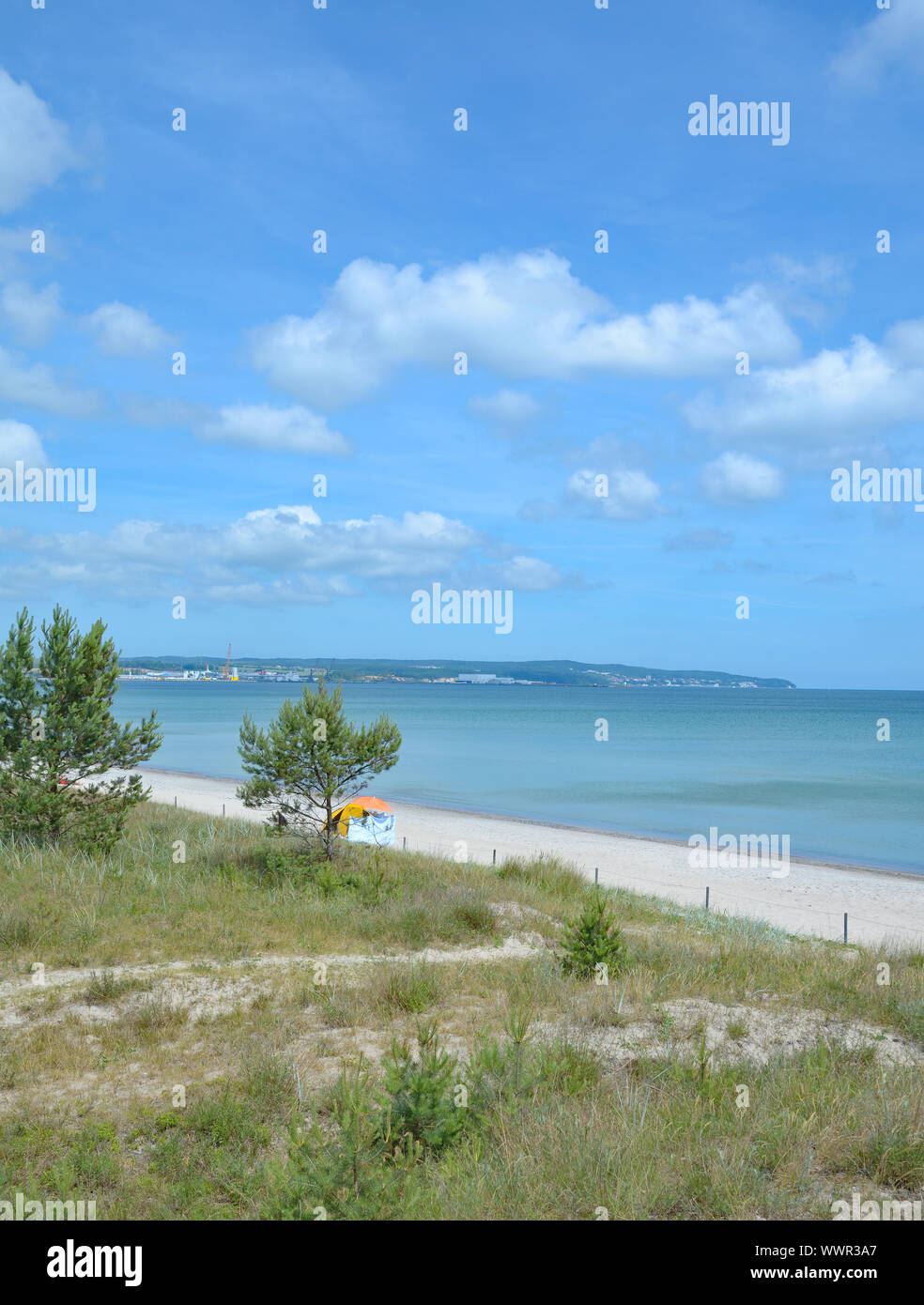at the beach of Prora with Sassnitz and Neu-Mukran in the background Stock Photo