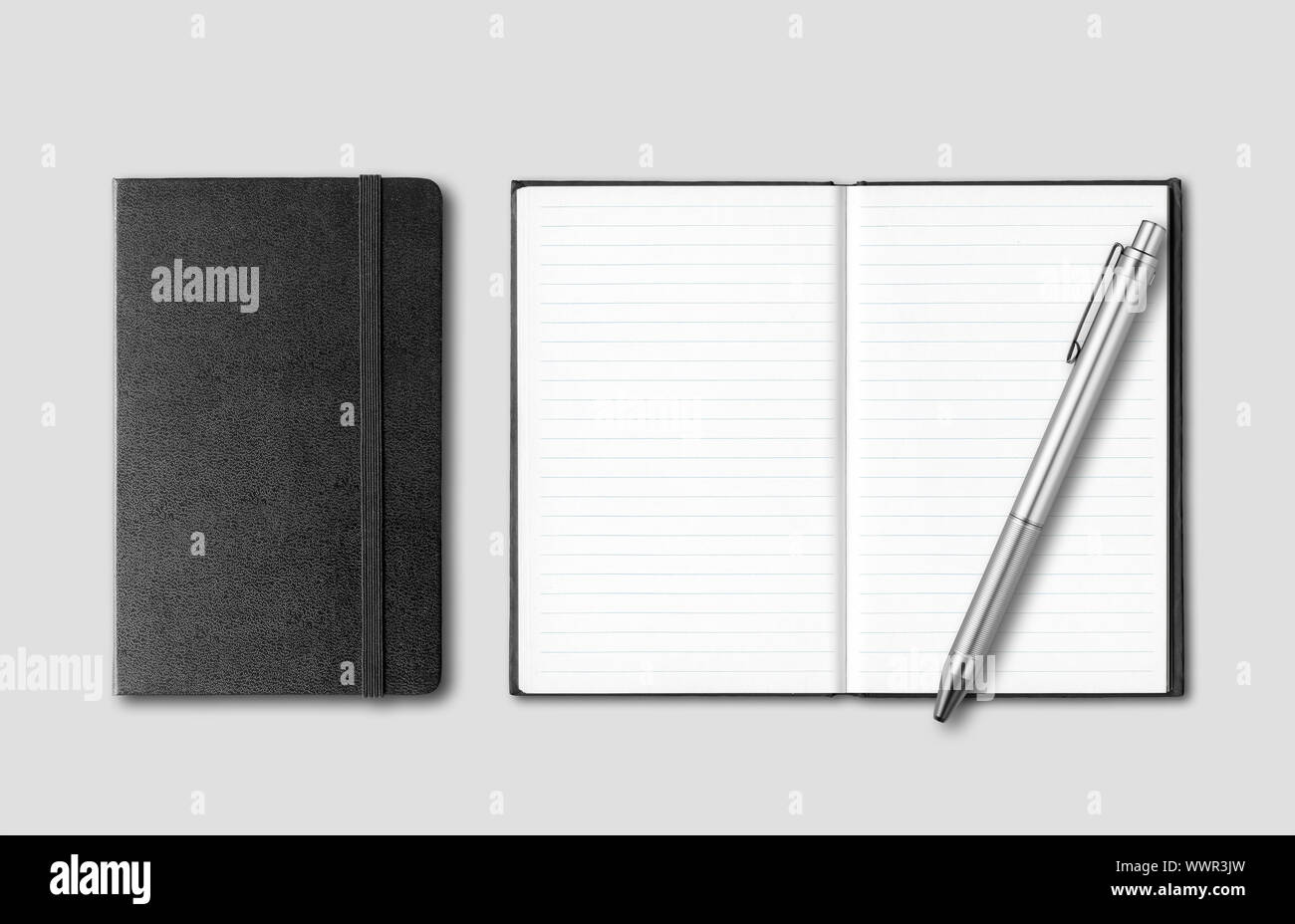 Black closed and open notebooks with pen isolated on grey background Stock Photo