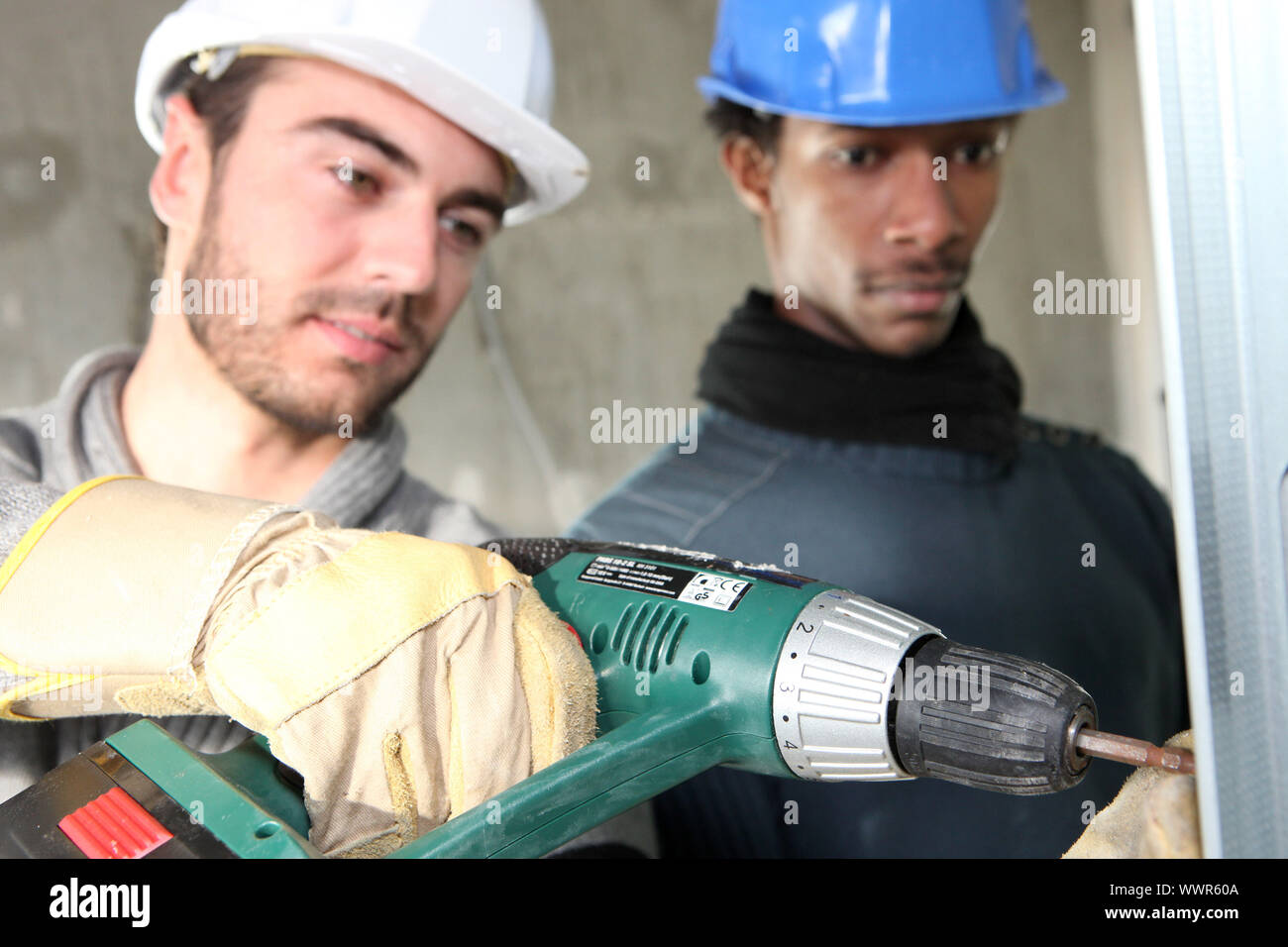 Electricians on construction site Stock Photo Alamy