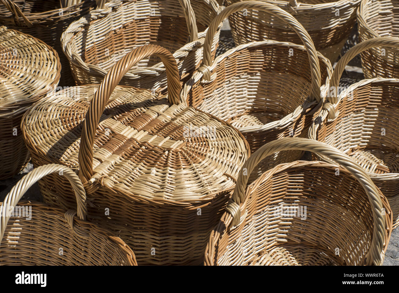 Shopping, wicker baskets handmade in a traditional medieval shop