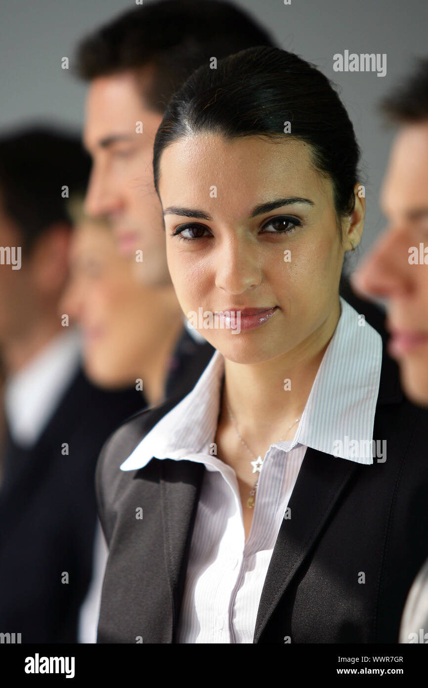 Businesspeople stood in a row Stock Photo