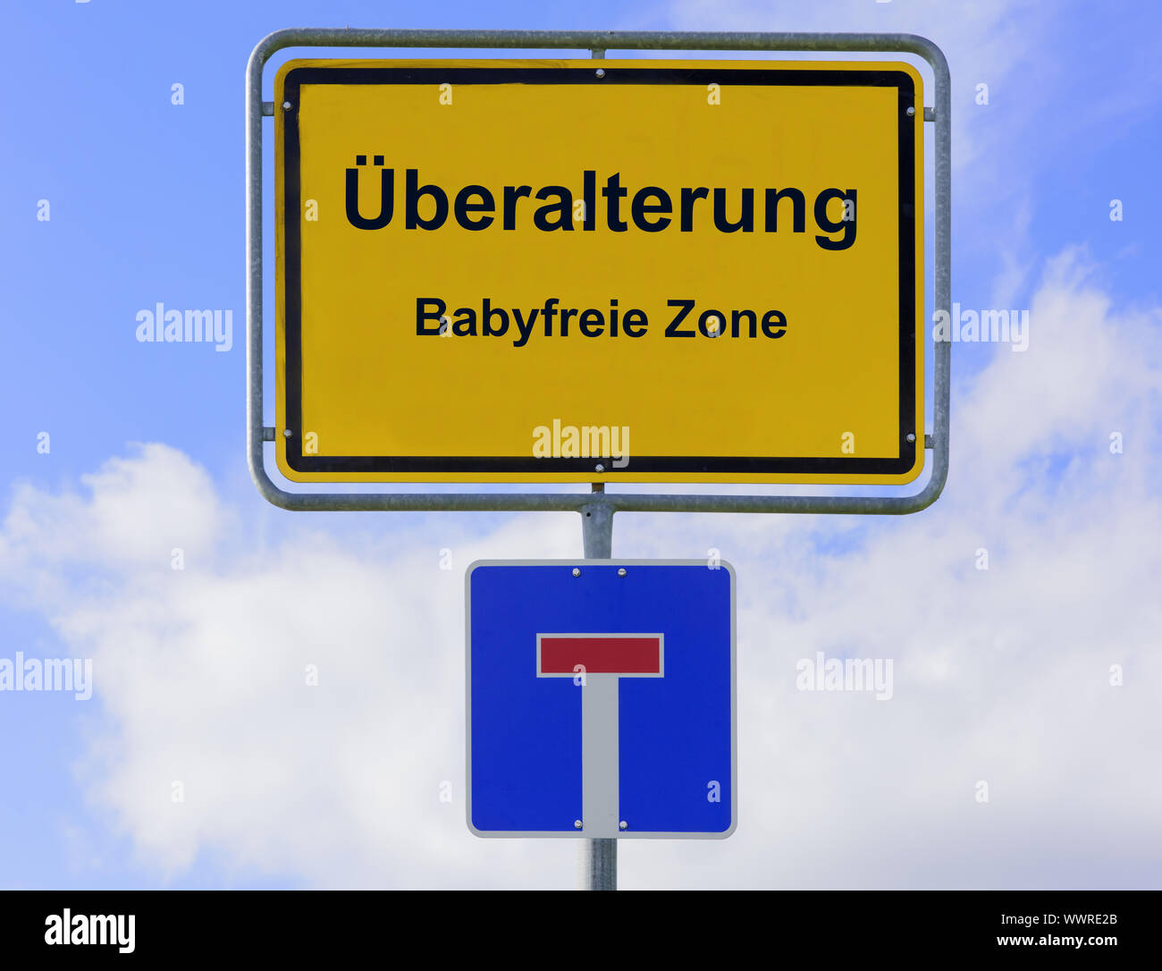 Overaging in the baby-free zone on the place-name sign Stock Photo