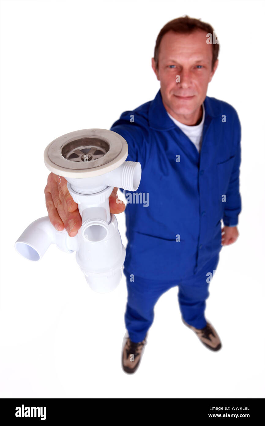 Plumber holding replacement sink plug Stock Photo Alamy