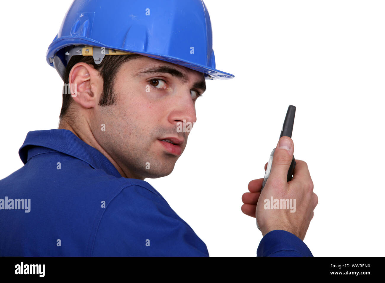Builder using a walky talky Stock Photo
