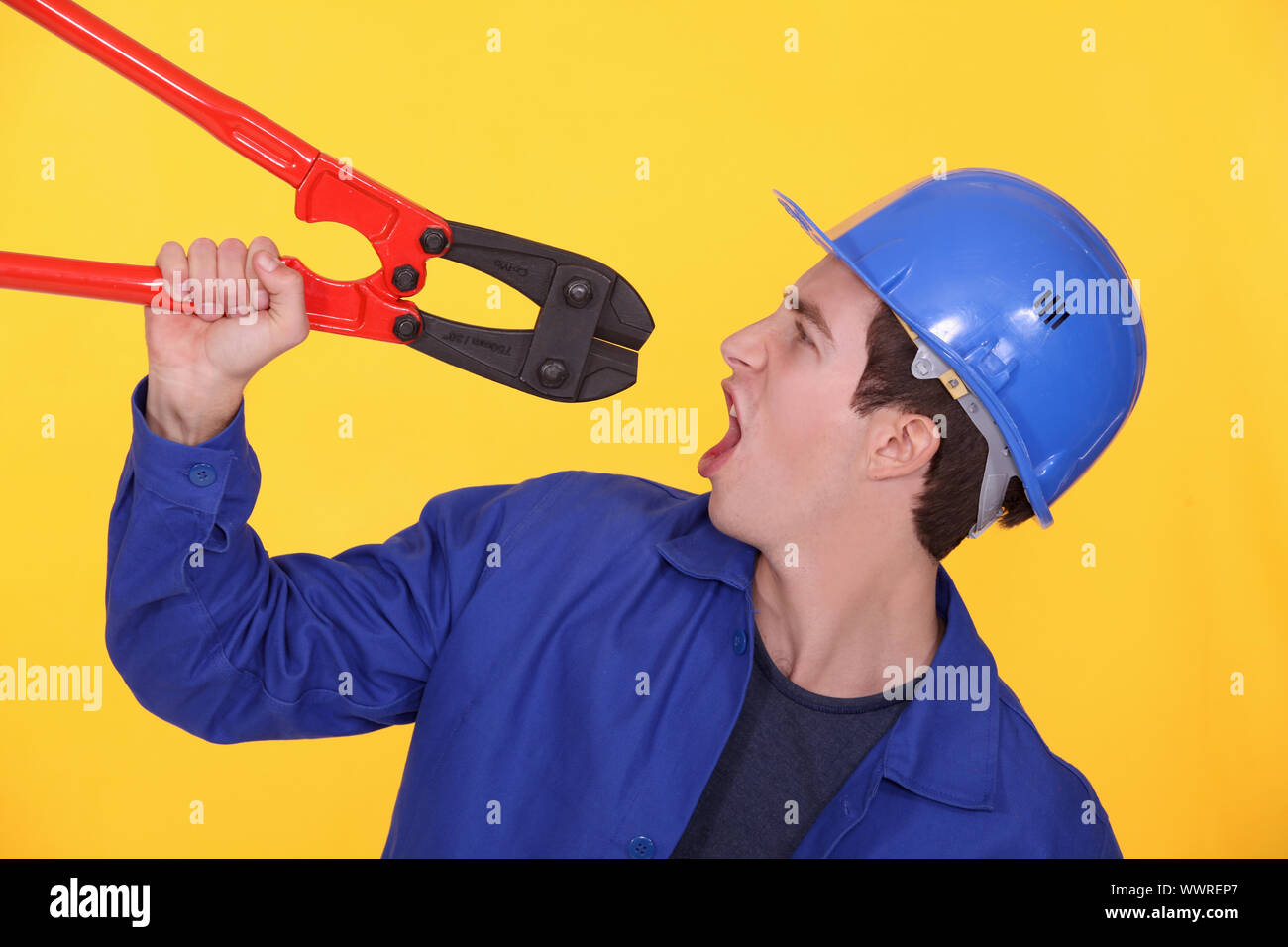 Man holding bolt cutters hires stock photography and images Alamy