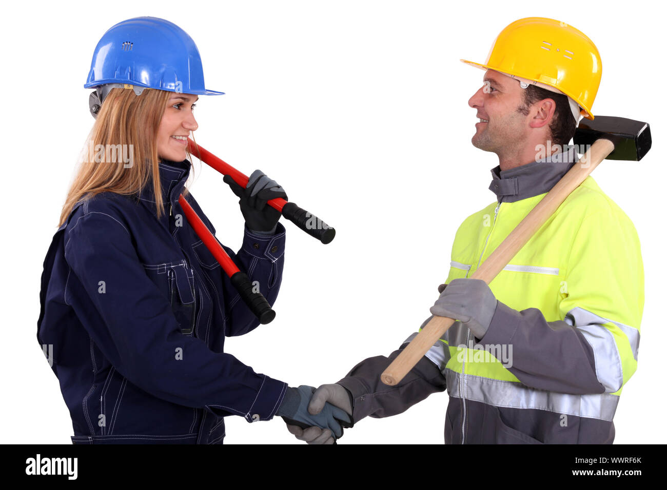 two construction workers shaking hands Stock Photo Alamy