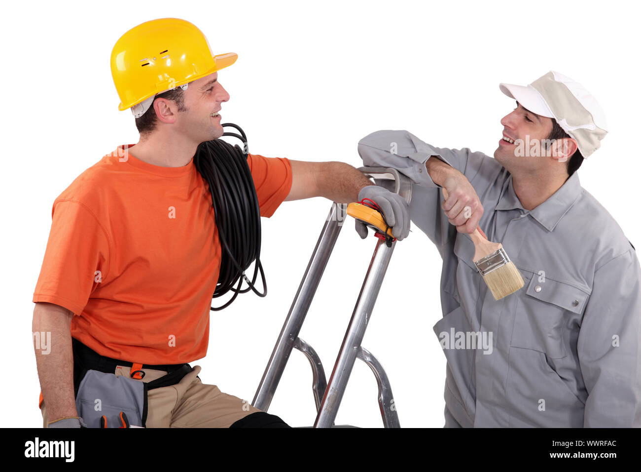 a house painter and an electrician laughing Stock Photo