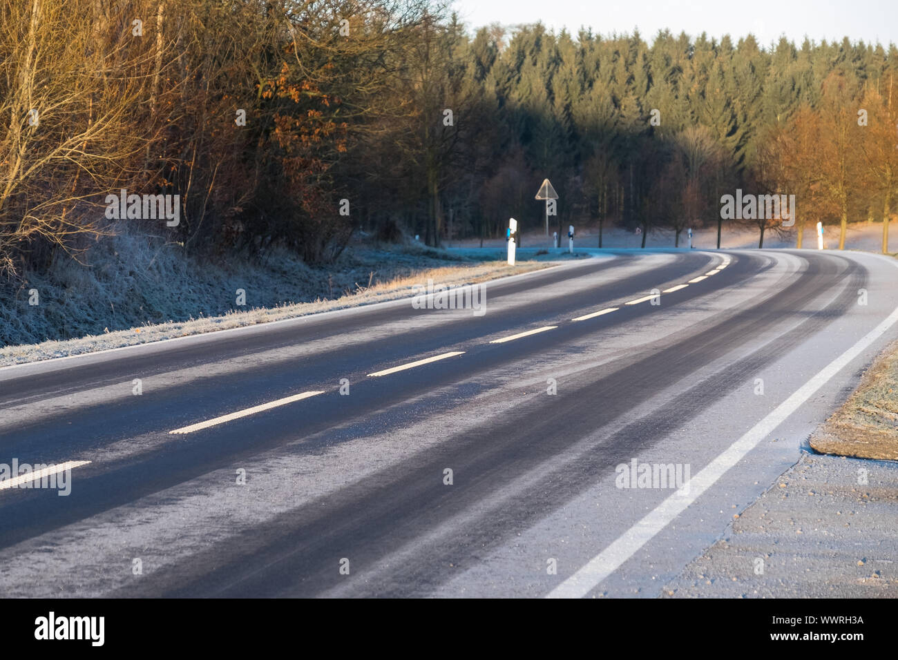 wintry road with frosty ice Stock Photo