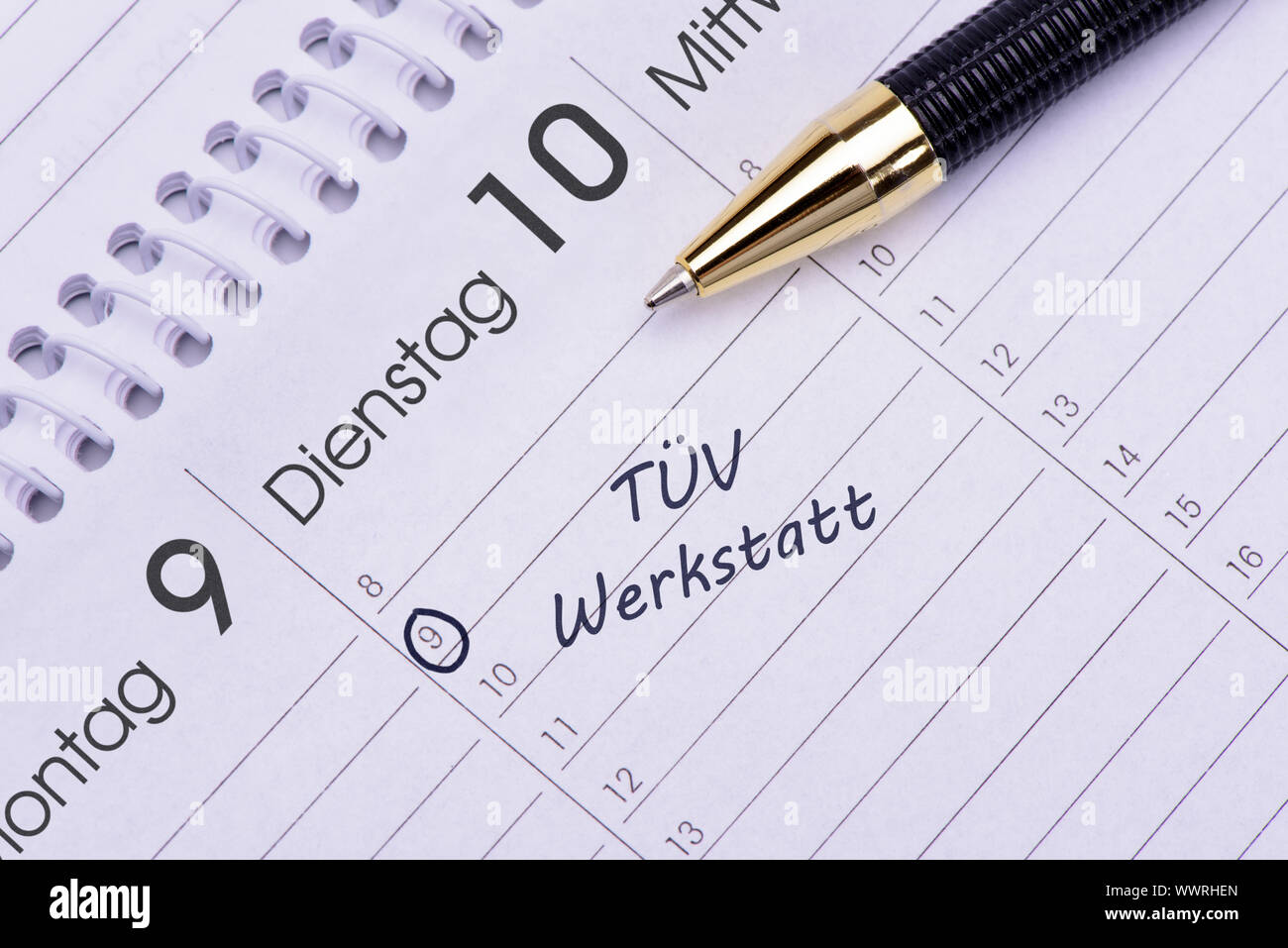 TÜV and workshop date in calendar Stock Photo