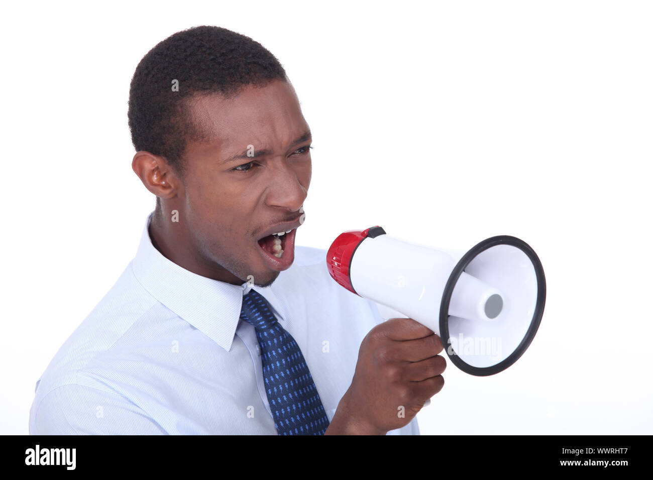 African man shouting through a megaphone Stock Photo